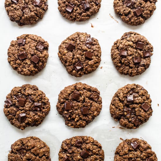 Chocolate oatmeal cookies on a baking sheet.