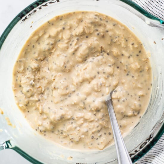 a bowl of food with a spoon in it.