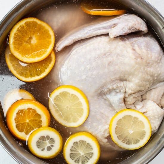 Brining a turkey in pot.