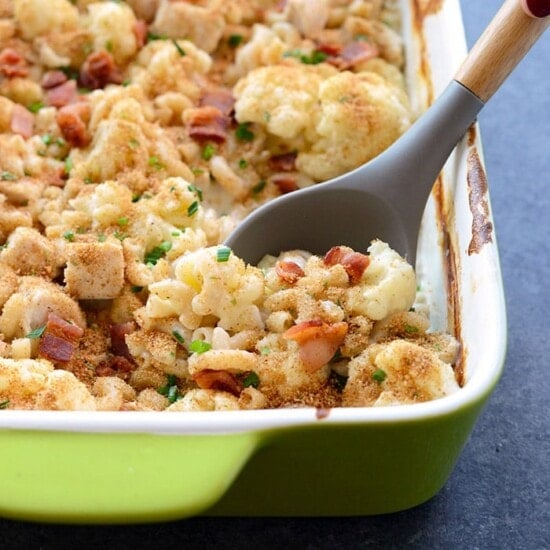 Cauliflower casserole in a green dish.